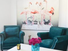 5 Star holiday rentals on the French Rivera - teal armchairs and flamingo painting