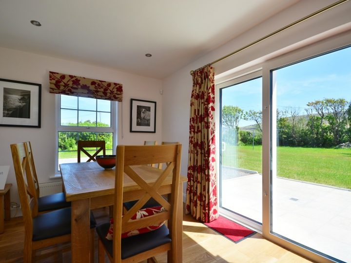 Luxury Holiday Homes Ireland Dining table looking into garden