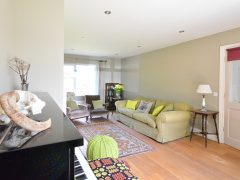 Exclusive holiday cottages Kerry - Skull on Piano and living room