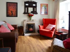 Holiday Homes Ireland - Lounge and fireplace